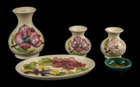 A Collection Of Handpainted Moorcroft Pieces - Five Items In Total. Floral Design, Hibiscus,