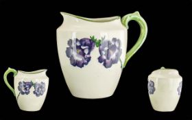 Wemyss Hand Painted Jug, Purple Flowers on White Ground, Green Handle. Signed to Base. Height 6