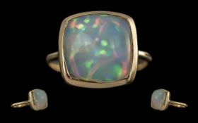 Ladies 14ct Gold Single Opal Set Ring. Marked 14ct to Shank. Opal of Pleasing Colours, Est 3.5