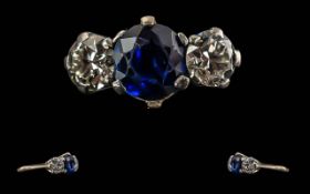Ladies Excellent 18ct Gold 3 Stone Diamond and Sapphire Set Ring. Marked 18ct and Platinum to