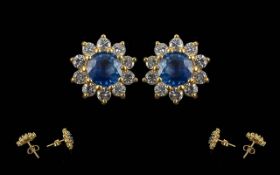 Ladies Fine Pair of 18ct Gold Sapphire and Diamond Set Earrings. Marked 18ct. The Central Blue