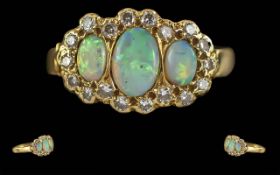 Ladies 18ct Gold Opal and Diamond Set Ring. Full Hallmark to Interior of Shank. The Central Opals of