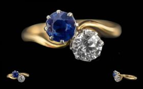Ladies 18ct Gold Diamond and Blue Sapphire Set 2 Stone Ring. Marked 18ct to Shank. Sapphire /