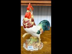 Capodimonte Cockerel Figure, marked to base E & S OD.229 Italy, measures 12'' high, raised on a