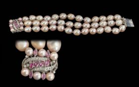 Ladies - Quality Fresh Water Pearl Set Bracelet With White Metal Clasp Set with Rubies and Diamonds.