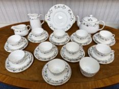 Minton 'Dryden' Tea Set, comprising teapot, creamer, sugar bowl, ten cups and saucers, ten 6.5''