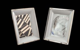 Two Cartier Porcelain Trinket Trays, made by Limoges, one with a black and gold geometric art deco