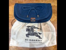 Burberry Iris Clutch Bag, indigo green textured leather with bow finish and magnetic gold tone