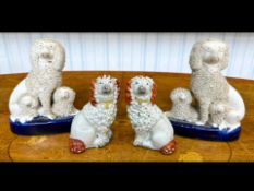 Collection of Antique Staffordshire Pottery Spaniel Dogs, comprising a pair of dogs with two