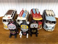 Four Large Vintage Style Metal Tin Models of VW Camper Vans, three with roof racks with surfing