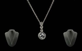 9ct White Gold Diamond And Aquamarine Pendant, Three Round Modern Brilliant Cut Diamonds Collet