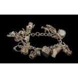An Excellent Vintage 925 Silver Charm Bracelet - Loaded with 20 Silver Charms. All Marked for