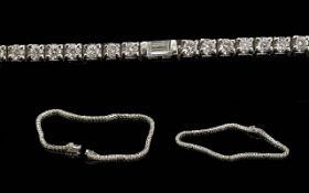 Ladies 18ct White Gold Baguette and Brilliant Cut Line Bracelet. Hallmarked for 750. Diamond