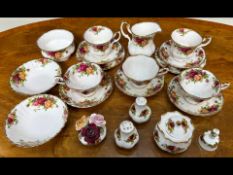 Royal Albert 'Old Country Roses', comprising five cups and saucers, milk jug, sugar bowl, two side