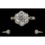 Ladies 1920's 18ct White Gold Diamond Set Cluster Ring. Marked 18ct to Interior of Shank. Well