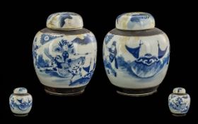 A Pair of Antique Blue and White Ginger Jars depicting battling figures on horse back. One cover