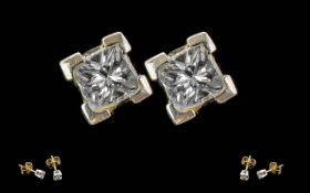 Pair Of 18ct Gold Stud Earrings, Set With Princess Cut Diamonds Approx ,20ct Each.