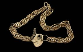 Ladies - Fine 9ct Gold Ornate Open Worked Bracelet with 9ct Gold Padlock. Marked 9.375. Warm