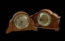 Two Elliott Mantle Clocks, one mahogany one oak cased, both with silvered chapter dials and Roman