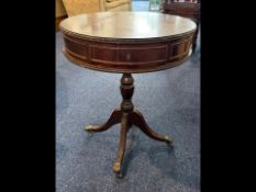 Mahogany Regency Style Drum Table, with central pedestal base with four splayed legs and claw feet
