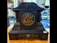 A Large Black Slate Mantle Clock, Architectural form, black chapter dial with gilt Roman Numerals