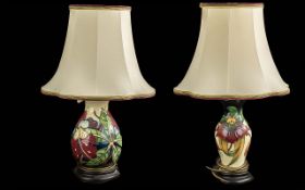 Two Moorcroft Lamp Bases with shades. Comprising Simeon pattern and Anna Lily patterns. Tallest
