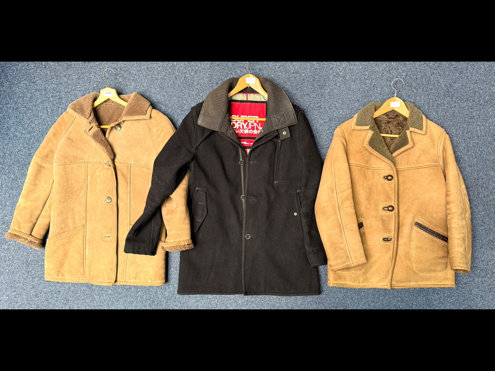 Three Jackets to include Gents Navy Blue Super Dry Jacket and Two Ladies Sheepskin Jackets - Gents
