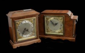Two Elliott Mahogany Mantle Clocks, both with silvered dials and Roman numerals, one marked Stewart,