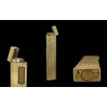 Dunhill - Switzerland Gold Plated Longboy Butane Lighter, Hobnail Design. Length 12.5 cms.