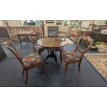 Four Victorian Balloon Back Dining Chairs with drop in seats, together with a tilt top table 33''