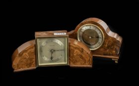 Two Walnut Elliott Mantle Clocks, both with silvered dials and Roman numerals, one marked