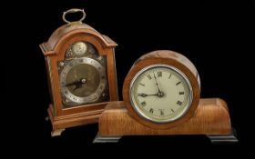Two Mahogany Elliott Mantle Clocks, one marked for Garrard & Co., Tallest 7''.