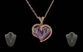 18ct Gold Amethyst And Diamond Pendant, Suspended On A Fine Link Chain, Carved Shell Shaped Amethyst