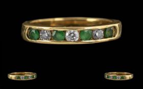 Ladies 18ct Gold Diamond and Emerald Set Channel Set Ring. Full Hallmark to Interior of Shank.