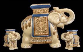 Elephant Plant Stand, height 17'', together with a boxed set of Paris Chef's 4 Dessert Plates, and a