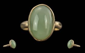 Ladies 18ct Gold Single Stone Green Jade Set Ring. Marked 18ct to Shank. Cabouchon Cut Jade of