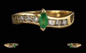 Ladies 18ct Gold Emerald and Diamond Set Ring. Marked 750 - 18ct to Shank. The Boat Shaped Emerald