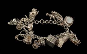 An Excellent Vintage 925 Silver Charm Br