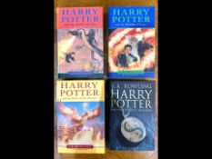 A Collection of Four First Edition Harry