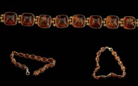 18ct Gold Amber Bracelet, Set With 16 Po
