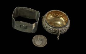 925 Sterling Silver Napkin Holder + 925 Silver Bowl and Silver Coin. Combined Weight 68 grams.