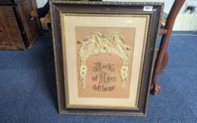 Pair of Continental Needlework Religious Pictures, 19th century, central text on first reads 'Rock