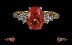 Ladies 18ct Gold Fire Opal and Diamond Set Ring. Marked 750 to Shank. The Orange Fire Opal of