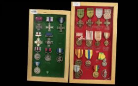 Two Display Cases Containing a Collection of Medals, 23 in total, including various countries,