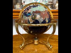 An Inlaid Gem Set Globe on heavy brass legs and mount, outer ring approximately 18'' diameter.