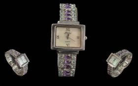 Ladies Sterling Silver Fancy Gems Blue Topaz & Amethyst Quartz Watch. Stamped for 925 Silver. With