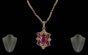 Ladies 14ct Gold Ruby and Diamond Set Pendant Drop Attached to a 14ct Gold Quality Chain. Stamped