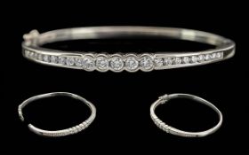 Ladies Pleasing Quality 18ct White Gold Diamond Set Hinged Bangle. Marked 750 - 18ct. Well Matched