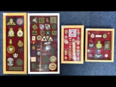Four Wooden Framed Display Cases containing cloth badges, mixed badges, Red Cross metal badges, etc.