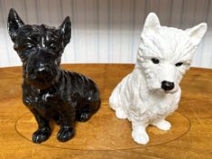 Pair of Cast Metal Whyte's Black & White Advertising Dogs, height 8''.